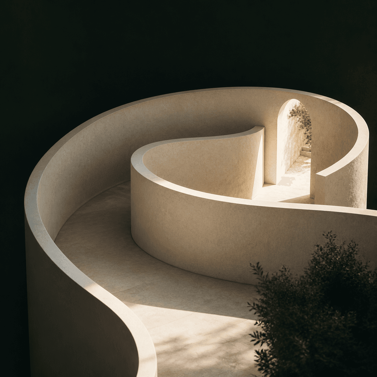 A curved limestone path leading toward a sunlit opening